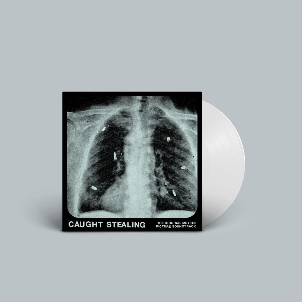 the album cover for IDLES feat. Rob Simonsen - Caught Stealing (The Original Motion Picture Soundtrack)