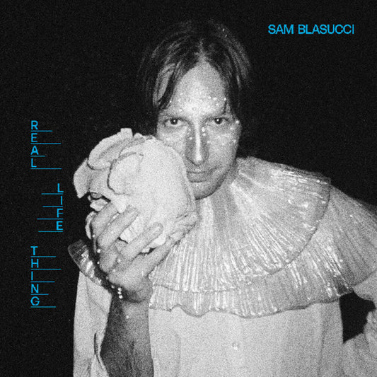 the album cover for Sam Blasucci - Real Life Thing