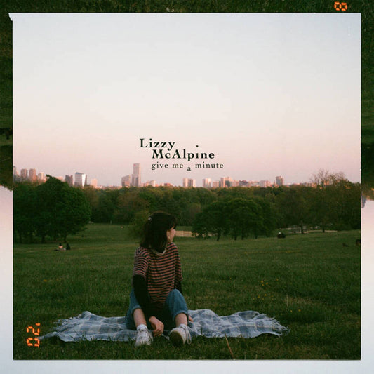 the album cover for Lizzy McAlpine - Give Me A Minute [Pink Colored Vinyl]