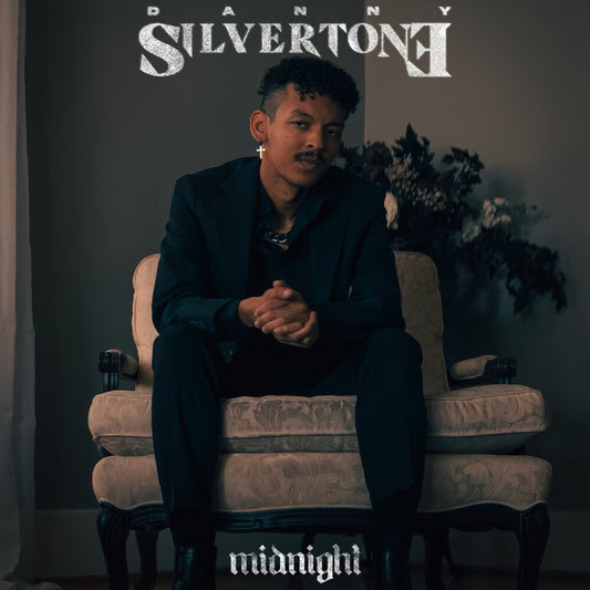 the album cover for Danny Silvertone - Midnight