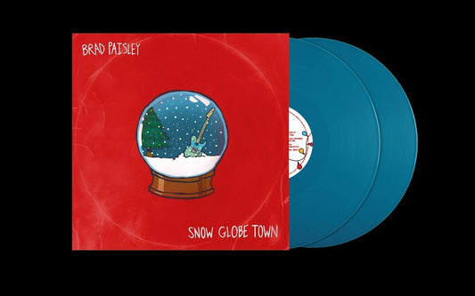 the album cover for Brad Paisley - Snow Globe Town [Aqua]
